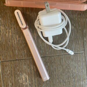 Solawave 4-in-1 Radiant Renewal Facial Wand with plastic case and charging cord